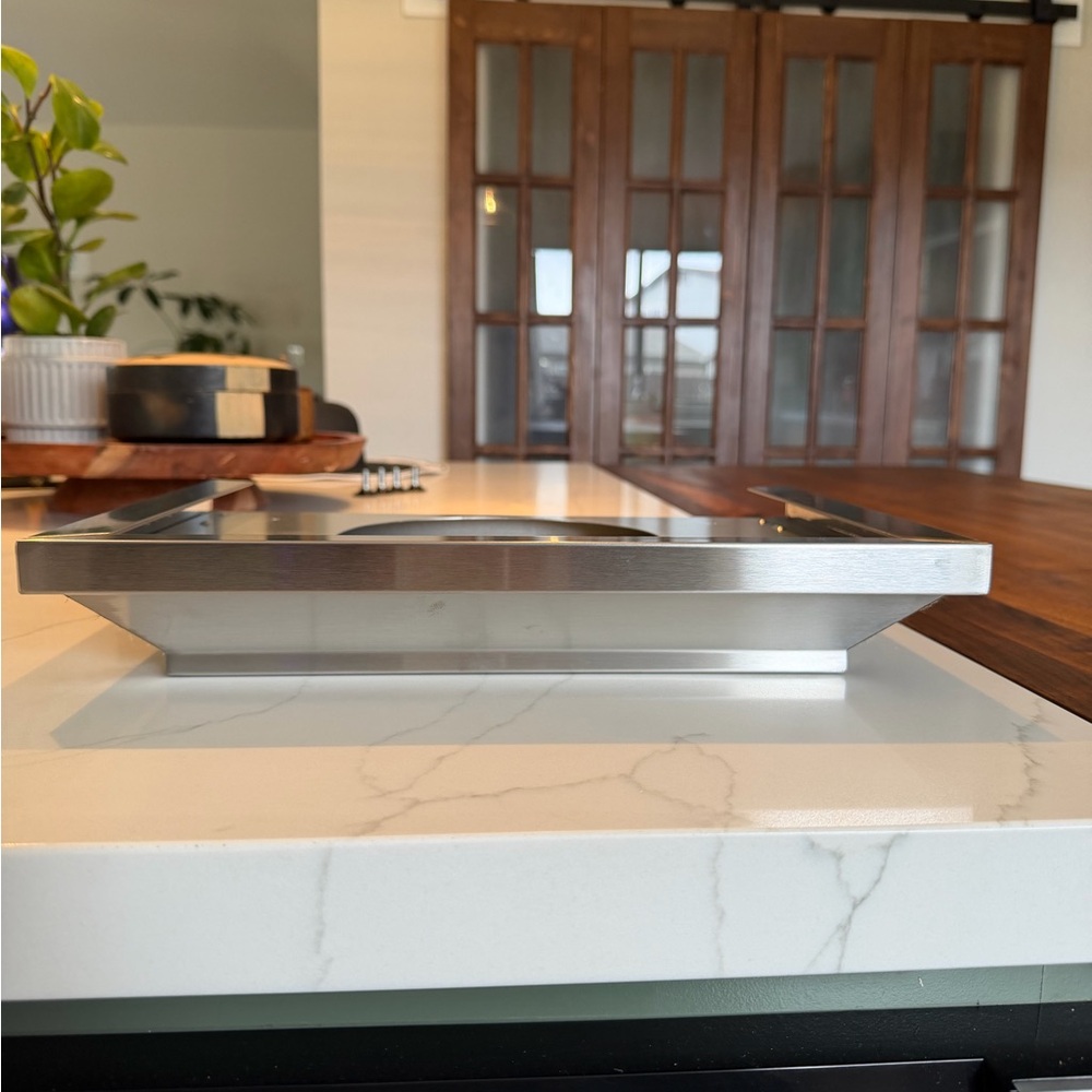 ZLINE Kitchen and Bath Stainless Steel Range Hood vent crown molding.